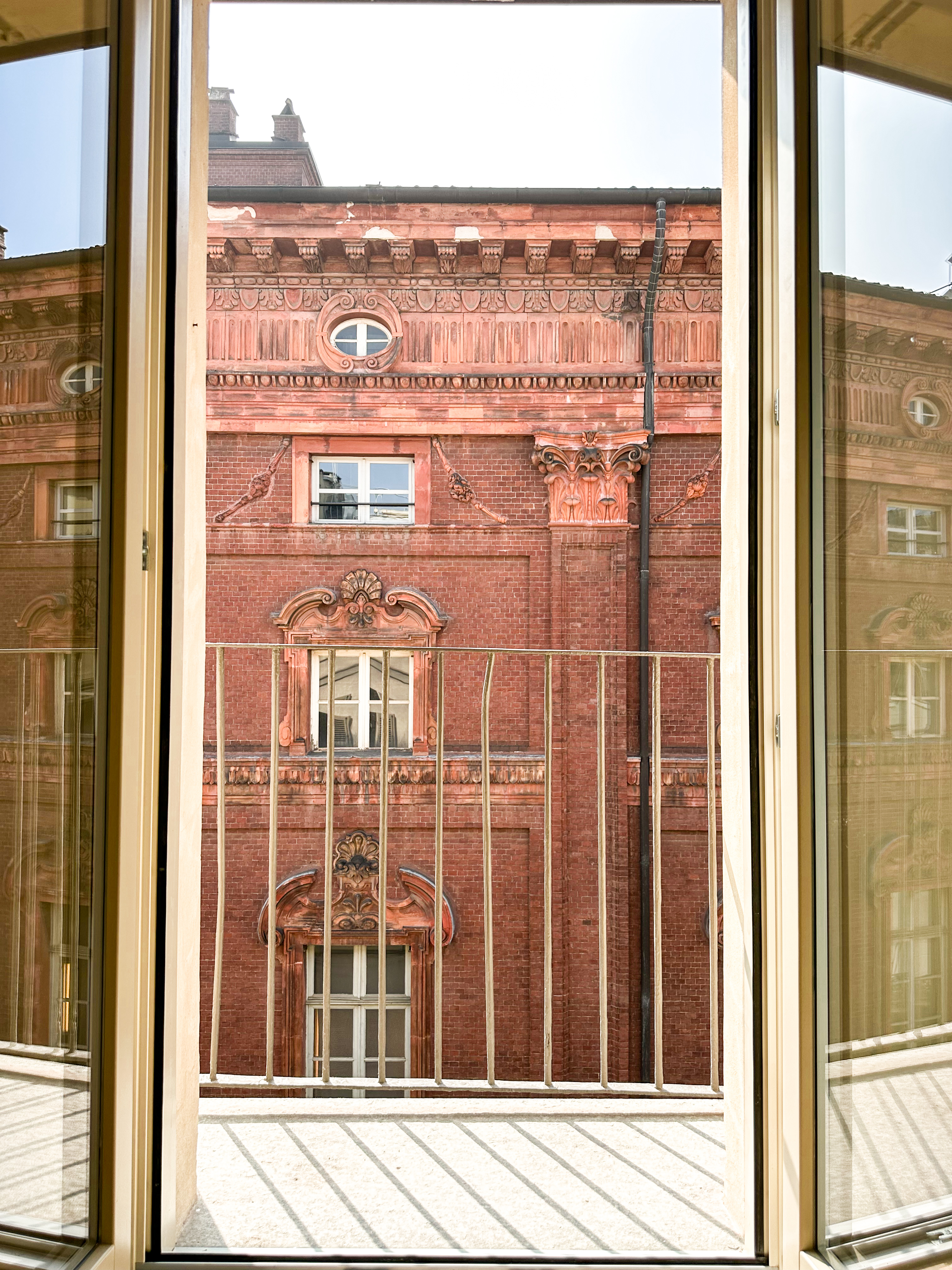 The balcony of the boutique stay at Casa Vermouth overlooking Turin