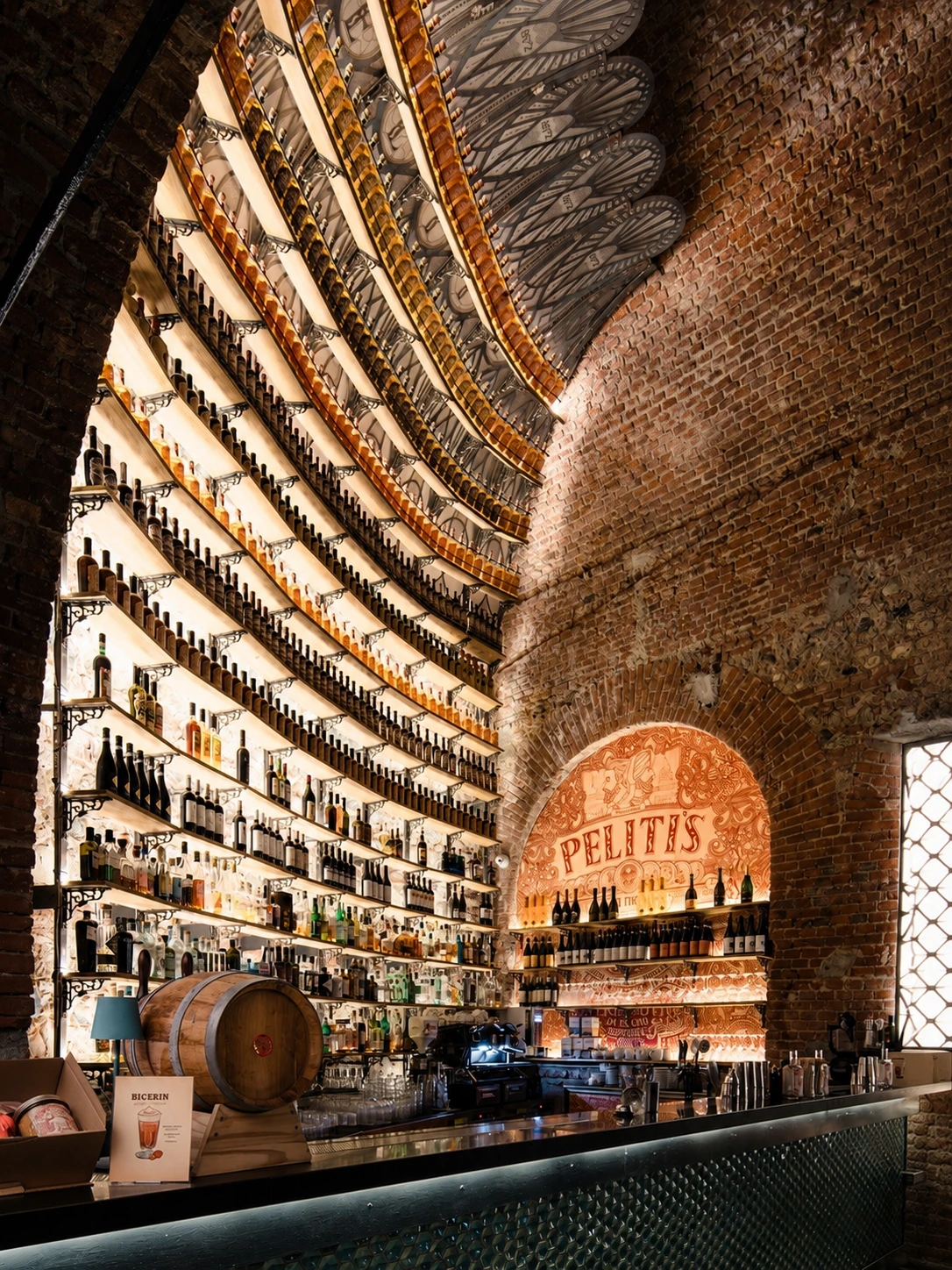 The Art Déco, bottle-lined interior of Peliti's vermouth bar in Turin